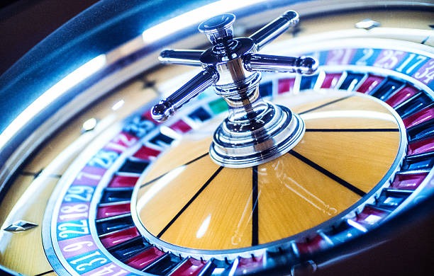 Result confirmation and payout settlement Dealer confirming American Roulette result on live broadcast